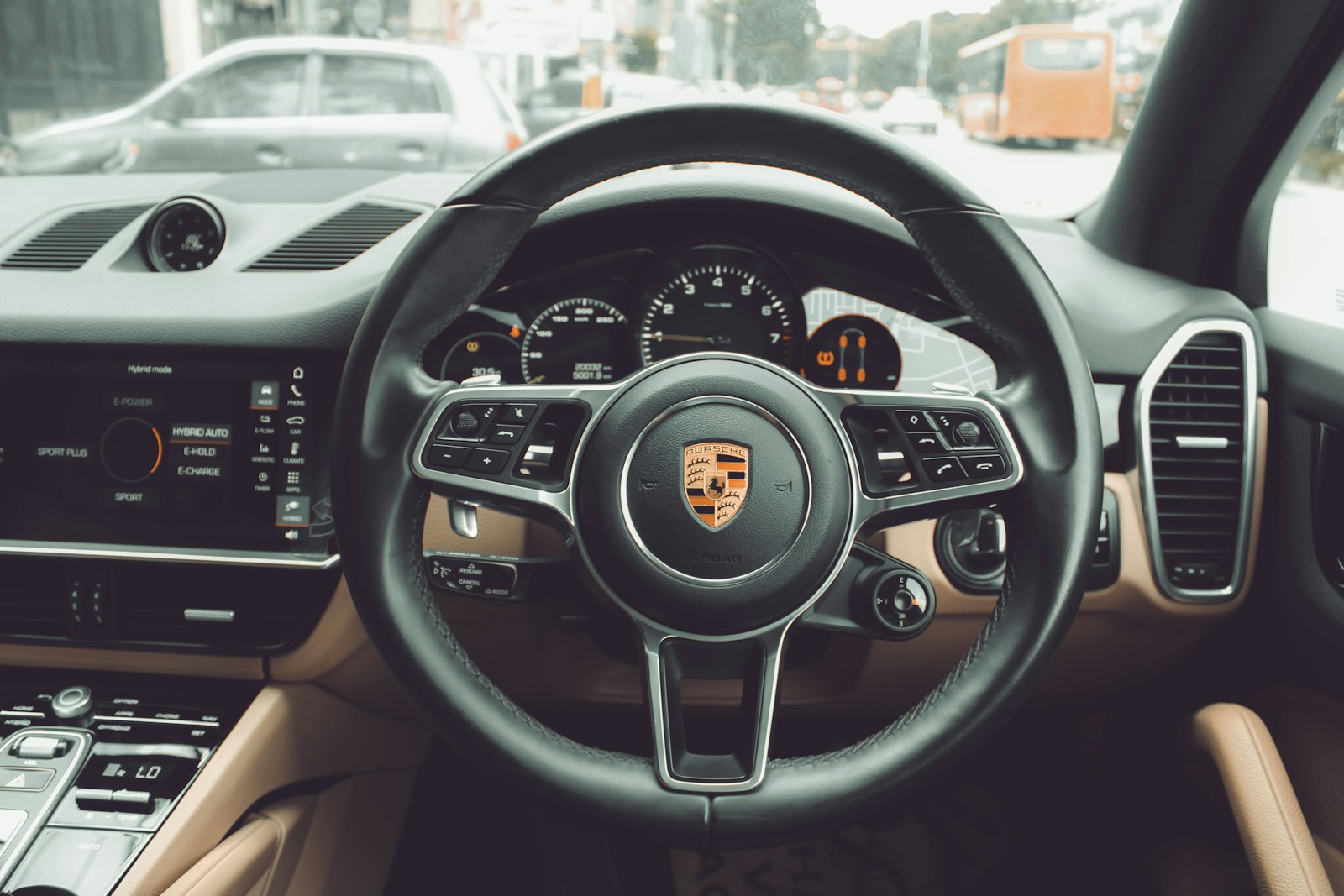 the interior of a car with a steering wheel and dashboard, auto